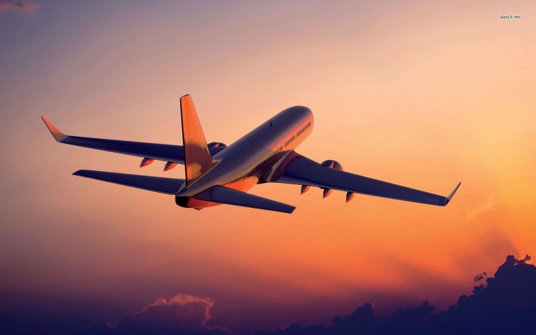 22137-airplane-in-the-sunset-1680x1050-aircraft-wallpaper